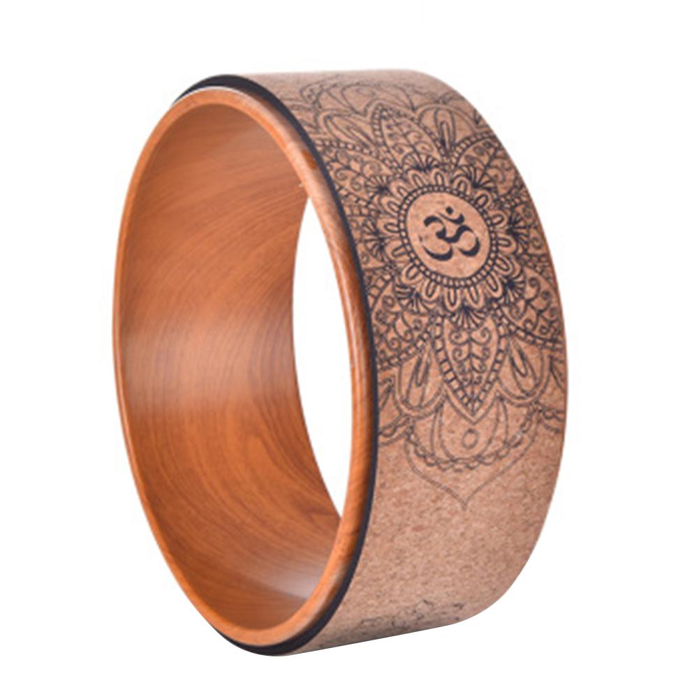 Om or AUM Cork Yoga Wheel. Ideal yoga wheel accessory for beginners. WickedYo.